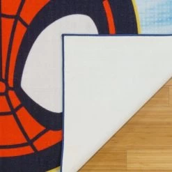 Marvel Spidey Circle 54"x78" Area Rug Blue -Professional Childrens Furniture Store GUEST a703c698 cf23 4ad4 8976 0791df2b0eb7